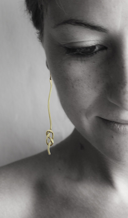 2 brass earrings